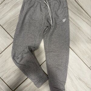 Woman’s new size S Reebok Heather Gray Sweatpants